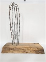Rustic barbed wire cactus on wood art