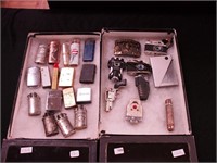 Two containers of cigarette lighters including