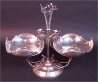 A silverplate epergne decorated with