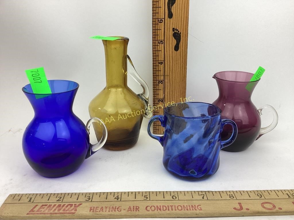 Vintage colored glass small pitchers
