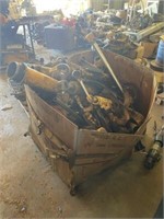 Large wood bin full of Hydraulic Cylinders