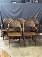 Five Oak dining arm chairs with curved cane and sp