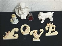 Group of angel decor and a dog