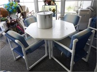 Lot #143 PVC patio furniture table with four