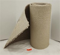 Small roll of carpet.