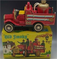 OLD SMOKY 1950 FRICTION POWERED FIRE TRUCK TIN TOY