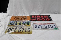 LICENSE PLATES AND BEWARE OF DOG SIGN