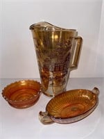 Carnival Glass Pitcher and Dishes