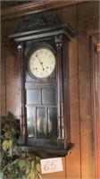 Ansonia clock in a 34 inches tall, 16 inches