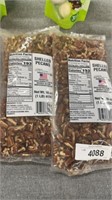 Two bags of shelled pecans