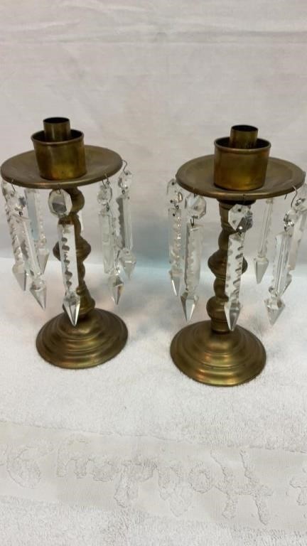 Brass candlesticks with glass prisms