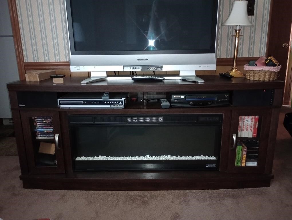 Great TV Stand with Electric Fireplace. Lots of