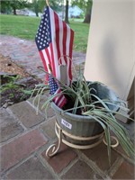 Plant in plastic pot w stand and flags