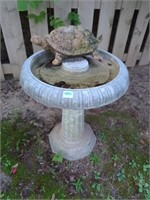 Plastic birdbath and turtle