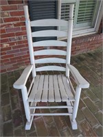 Cream colored wooden rocker