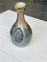 signed 10" tall pottery vase  w/ emblem