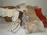 Assorted Towels in Browns, Oranges + Wicker