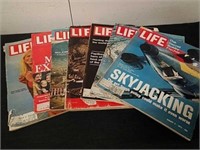 Seven vintage life magazines