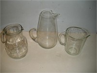 (3) Glass Pitchers  Tallest - 10 Inches