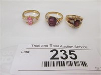 3 Ladies gold rings, multi stone rings