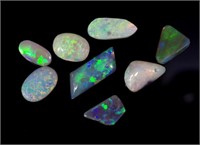 Eight loose crystal opals