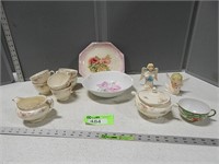 Cups; cream and sugar; angel figurines; flowered b