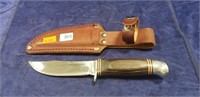 (1) Sharp Knife w/ Leather Sheath