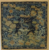 DETAILED CHINESE EMBROIDERY OF A FOO DOG & FOLIATE