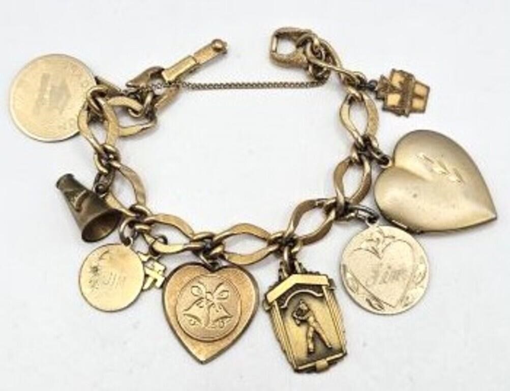 Monet Gold Tone Charm Bracelet with Charms