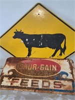 Cow crossing sign and Shur Gain signs