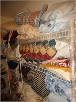 Contents of 6 shelves, blankets, comforters,
