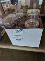 Lot of clear plastic storage canisters