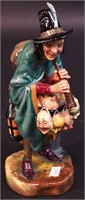 A Royal Doulton figurine, Mask Seller