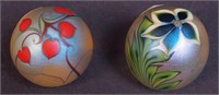Two art glass paperweights marked Orient and
