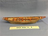 18 1/2" seal gut Umiak with 6 wooden paddles