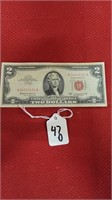 crisp 1963 red seal 2 dollar bill