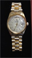 One gold tone marked Rolex Mens wristwatch,