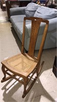 Cane seat rocking chair looks like maple