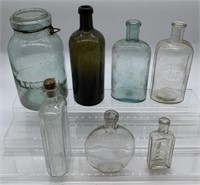 7 assorted bottles, flask and jar