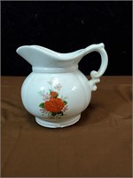 Floral design white McCoy pitcher approx 5 inches