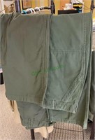 Two pairs vintage green military pants - one