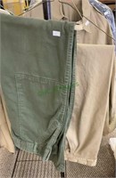 Two pairs military pants - one green, one khaki.