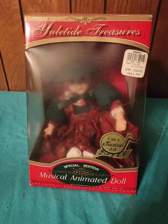 Musical animated doll