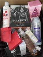 Box of Avon body wash, cologne and more