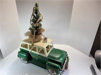 Metal Car Figurine Carrying Christmas Tree