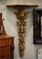 Pair of gilt putti architectural wall brackets
