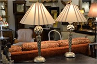 Pair of carved wood and silvered table lamps