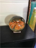 Orange flower glass paperweight