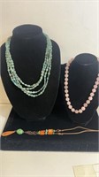 Lot of 3 necklaces-multi strand green, large pink