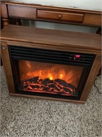 Electric fireplace heater is on casters tested
